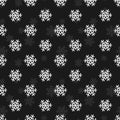 Vector seamless pattern with simple snowflakes on black background. Royalty Free Stock Photo